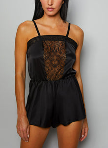 Adorn yourself in evening opulence and bask in elegant relaxation with our marvelous and sumptuous pleasure romper. The elastic waistband and luxuriantly-detailed sheer lace panels gracefully reveal your silhouette and redefine sensuous comfort.
