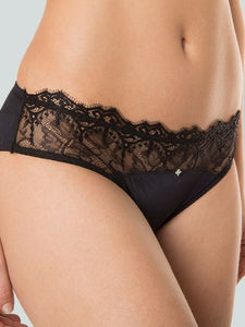 Encasing your figure with  allure, the Tessa brief captivates with its flirtatious embrace. Embellished with subtle ouvert detailing, adorned with gentle scalloping edges, the conditioned Italian soft-touch fabric and beautiful sheer lace conspire to create a mysterious illusion.                Seduction and comfort in a classic style.