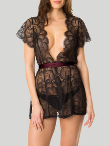Lace and silk charmeuse crafted into a dark, romantic bed jacket  that never goes out of style. Flirty flutter sleeves show a touch of skin while the silk sash pulls you in securely at the waist. 