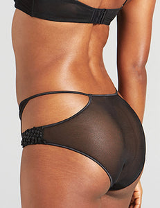  Tammy offers a curve-hugging fit to showcase your silhouette - sheer mesh panels peek through in the front and back, with Austrian embroidered sheen dot strips delightfully tracing your hips. Tonal Italian binding provides a clean finish with a touch of risqué allure.